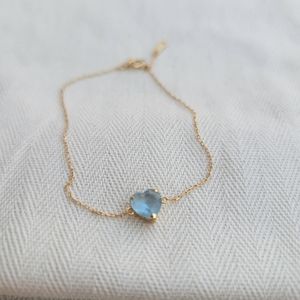 18k gold bracelet with blue topaz stone